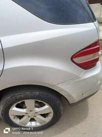 A picture of Awoof Awoof Awoof Awoof 2009 ML 500 Benz First body