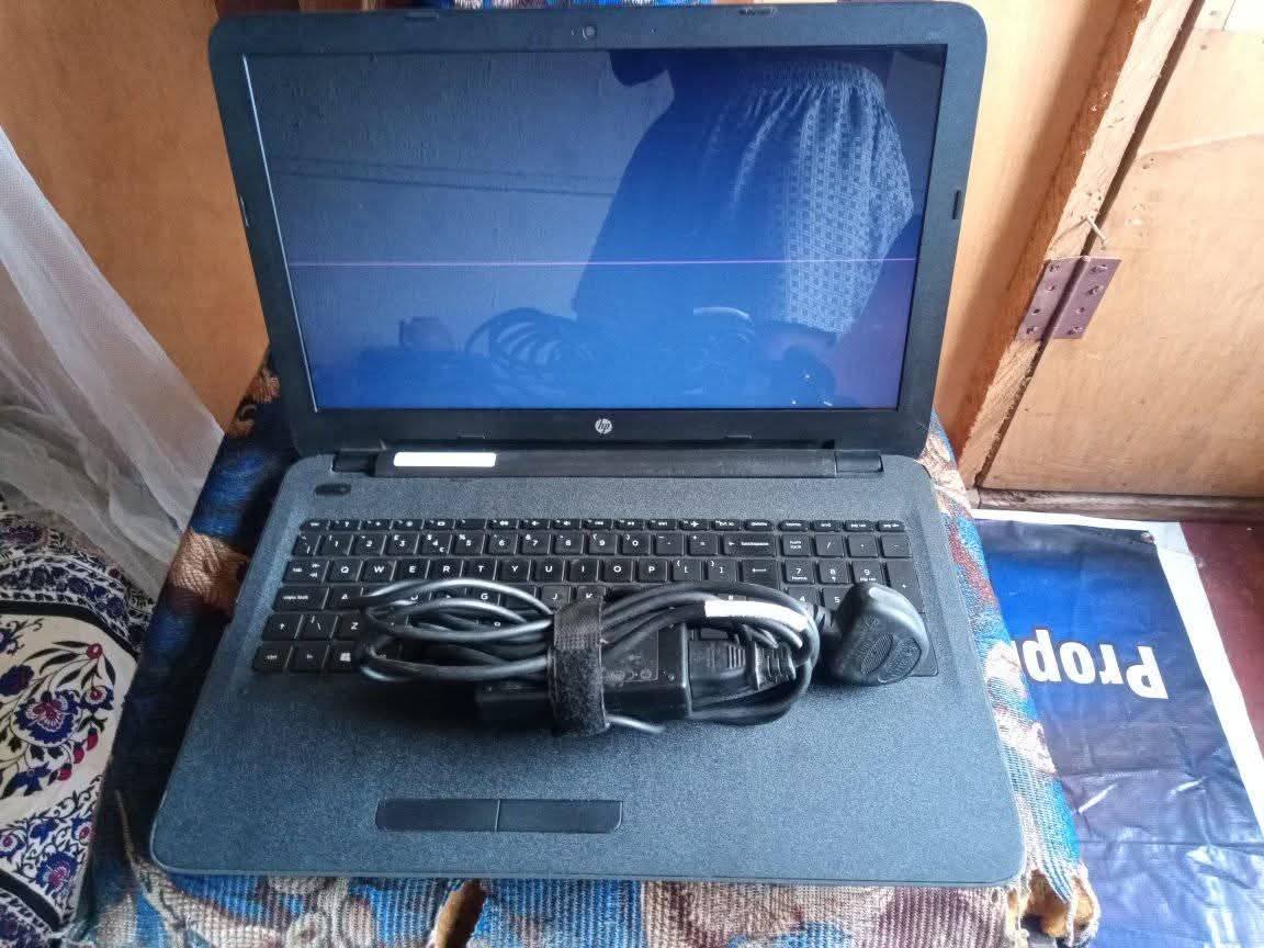 A picture of Grade one fairly used HP Slim Laptop