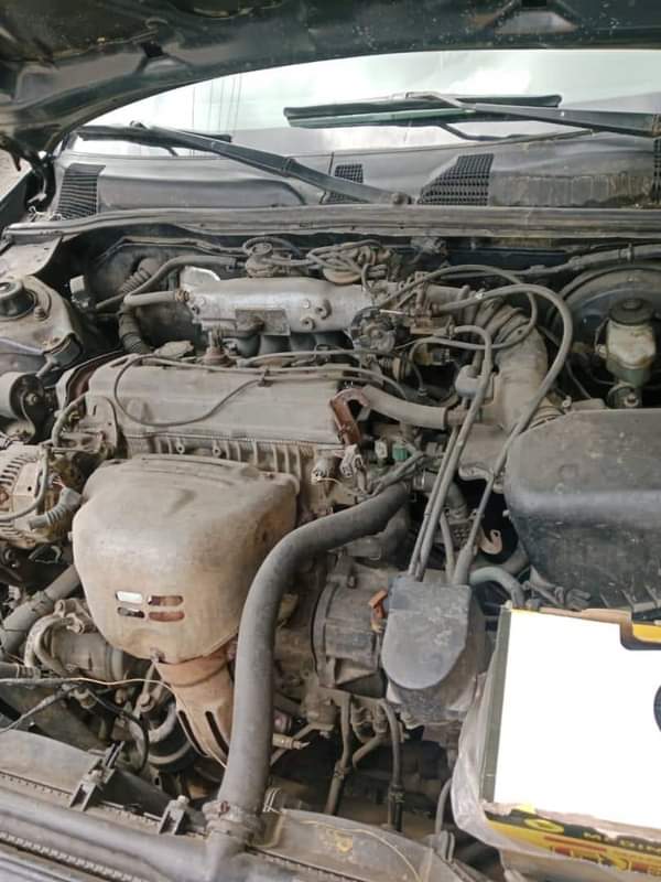 A picture of TINYLIGHT CAMRY 4 Plugs Good Engine and Gearbox AC WORKING