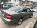A picture of Toyota Camry 2004 with Tokunbo Engine AC chilling Gear selecting