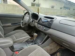 A picture of Neatly used Toyota Camry pure first body untempered engine gear