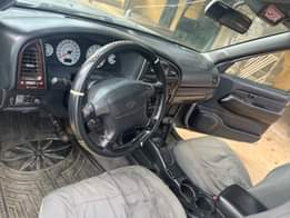 A picture of NISSAN PATHFINDER JEEP. FOUR WHEELS DRIVE. VERY GOOD ENGINE AND