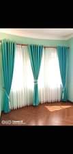 A picture of CURTAINS AND CURTAIN RODS