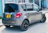 A picture of TOYOTA Ractis Bei million 9 5