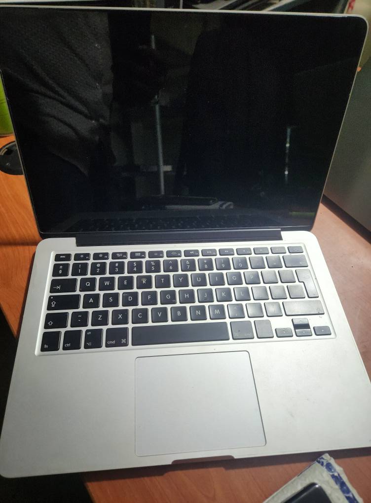 A picture of Few months used Apple macbook pro 2015 for 650k at