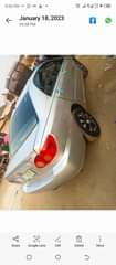A picture of Toyota Corolla year 05 tapping engine and transmission and ac