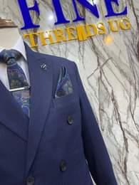 A picture of UG. SHS. 250 000 ONLY YES 250k ONLY SUITS SUITS