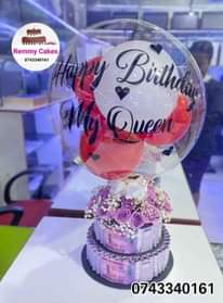 A picture of  flowerbouquet moneyhampers balloons cakes surprisepackages gifts deliveryavailable kampalaUg