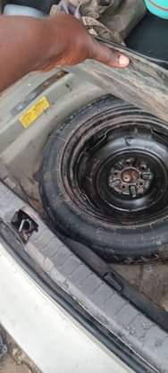 A picture of Fairly used Toyota corolla 2011 2012 Model Painted on first