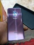 A picture of Samsung Galaxy s9 dual sim With cracks and a thin