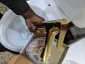 A picture of Golden handwash mixer