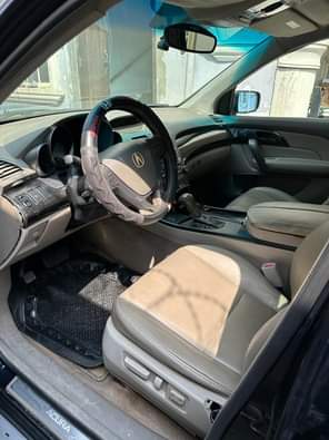 A picture of Acura MDX 2008 MODEL Bought in February Everything clean Price