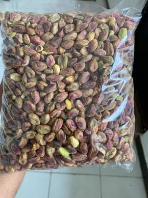 A picture of Pistachio kernels medjool dates and ajwa dates fresh stock available
