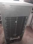 A picture of Samsung single door fridge with a big freezer with a