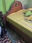 A picture of Kitanda mbao ngumu 5 6 Bei 145000 Bila godoro 0788053103