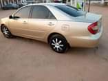 A picture of Toyota camry 2004 model with Untampered Engine Gear AC in