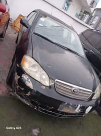 A picture of Toyota Corolla 2004 model body needs repackaging ac Is working