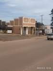 A picture of Two double shops on sale located nansana yesu Amala just