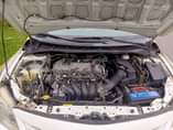 A picture of 2013 on belt corolla wit an untemperd engine everything sharp