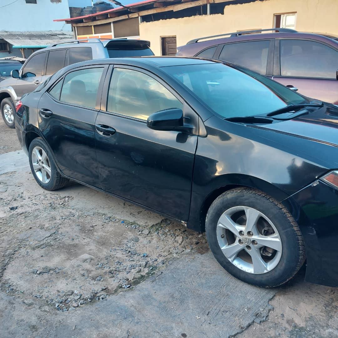 A picture of Toyota corollla 2015 registered Call 07089934099