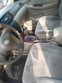 A picture of Very clean Toyota corolla everything working perfect including Ac going