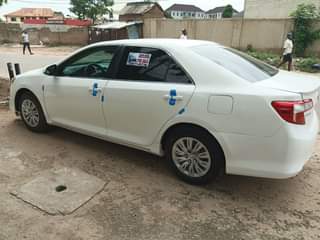 A picture of Distress foreign used 2013 Camry in pristine condition Going for