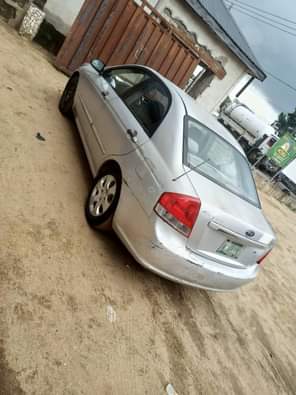 A picture of 2008 KIA CERATO SOUND ENGINE SHARP GEAR CHILLING AC COMPLETE