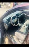 A picture of Total Corolla everything is perfect with Ac chilling Just buy