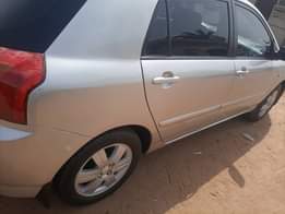 A picture of TOYOTA COROLLA OBAMA ENGINE AND GEAR AC IS WORKING NEAT