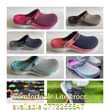A picture of Crocs and shoes