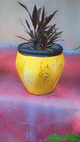 A picture of decorations garden decorations flower pots and beautiful flowers