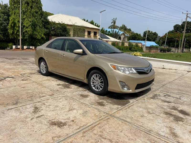 A picture of 2012 TOYOTA CAMRY LE KEYLESS FIRST BODY WITH DUTY AT