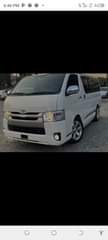A picture of Toyota Hiace Hummer Buss. 2014.