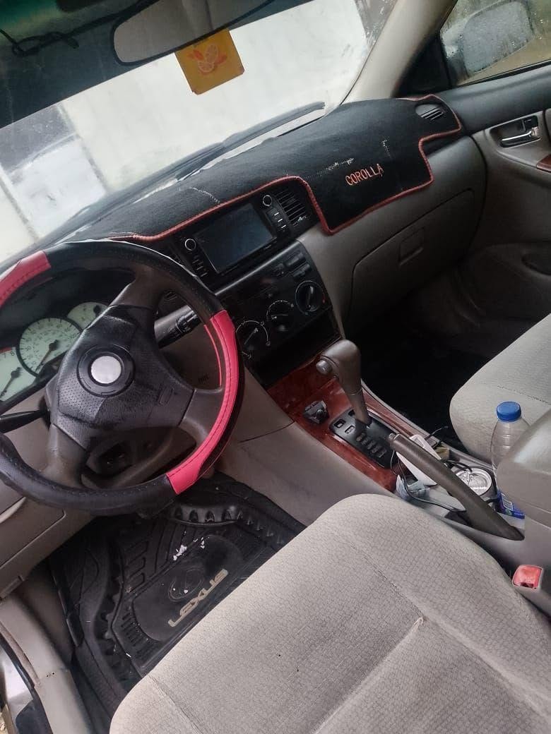 A picture of MAD Distress 2004 Toyota Corolla Buy and Drive