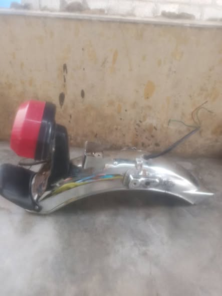 A picture of honda 125 back motorguard
