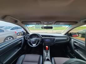 A picture of 2017 registered slightly used Corolla S neatly flashed on first