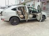 A picture of 05 pure first body Clean nd sound Lexus RX330 going