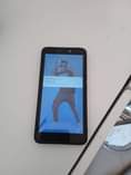 A picture of Nauza simu Tecno pop 2f kipengele hapa ni button ya