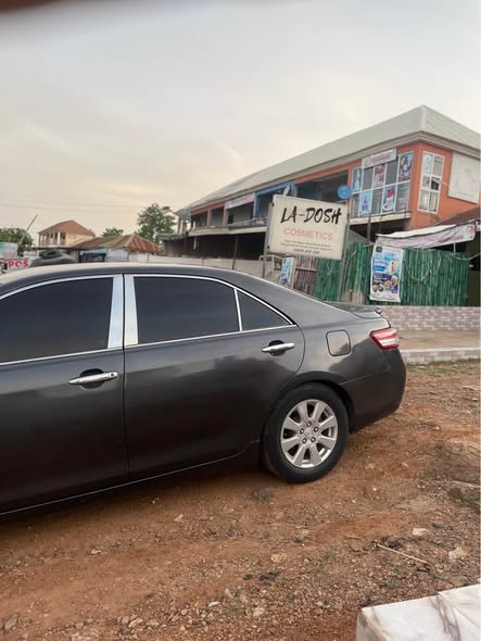 A picture of Super sharp 08 Toyota Camry with upgraded lights to 2010