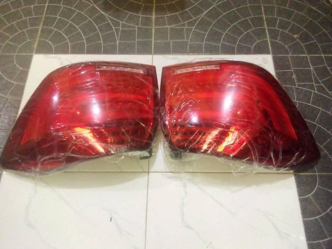 A picture of Toyota spare parts upgrading Head lamp rear light Vanza Camry
