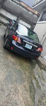 A picture of 2010 MODEL COROLLA NEATLY SPRAYED