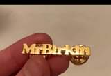 A picture of ustomized name brooches