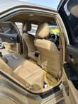 A picture of Premium Used 2014 Cream on Cream Toyota Camry LE