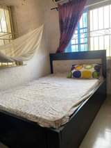 A picture of Bed frame Nd freezer