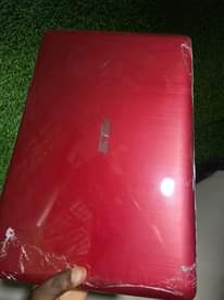 A picture of Beautiful red Asus laptop 4GB Ram 500GB hard disk