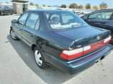 A picture of Sharp Direct auction tokunbo Toyota Corolla 97 A C chilling