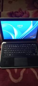A picture of Dell i7 touchscreen portable and convertible at only 750 000