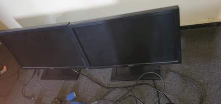 A picture of 2 Dell computer screen inch 20