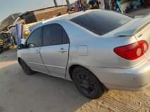 A picture of corolla 2006 model Good body only giving taping sound All