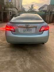 A picture of A 2011 Toyota Camry SE full options with 2024 Venza